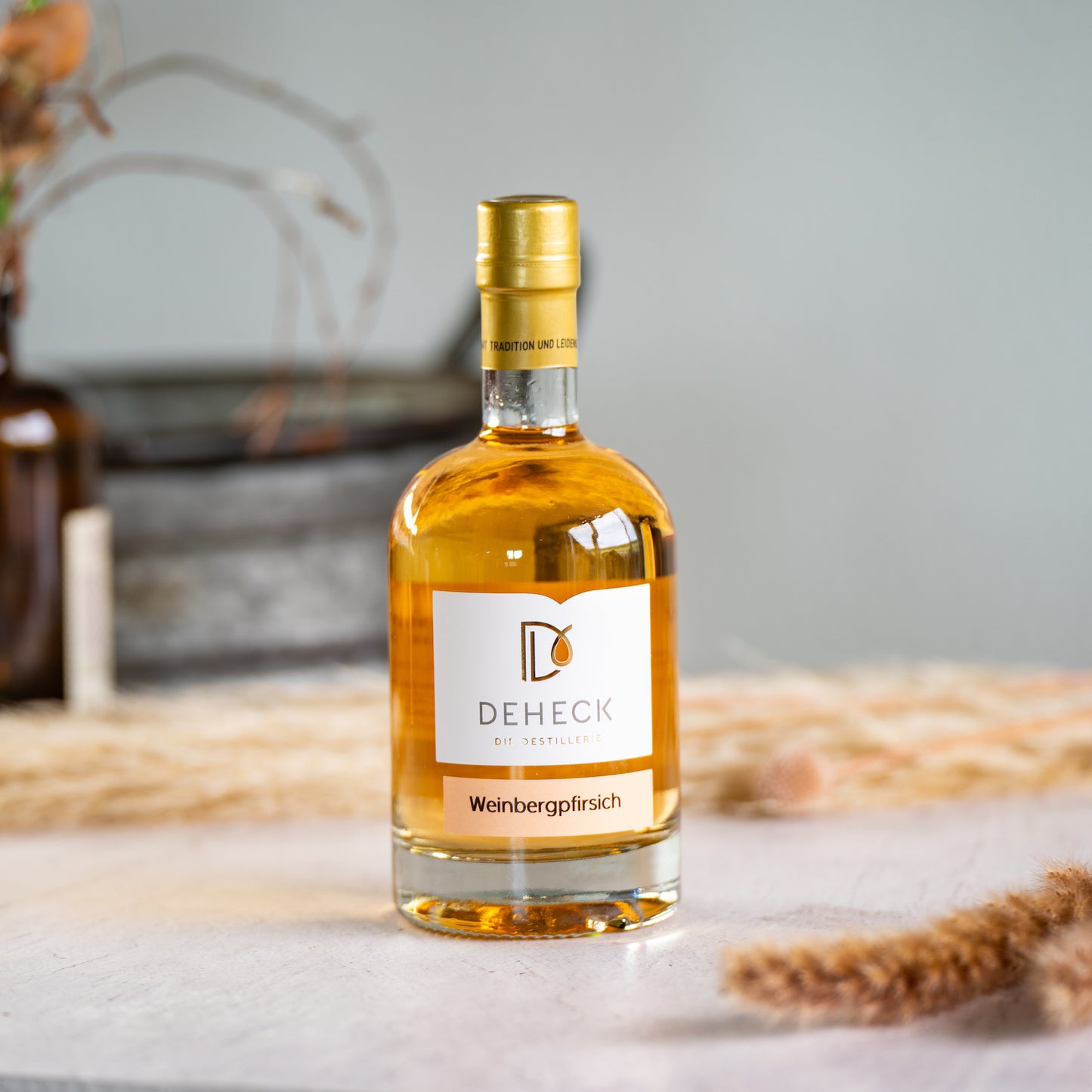 Weinbergpfirsich Likör von Deheck in der 500 ml Flasche
