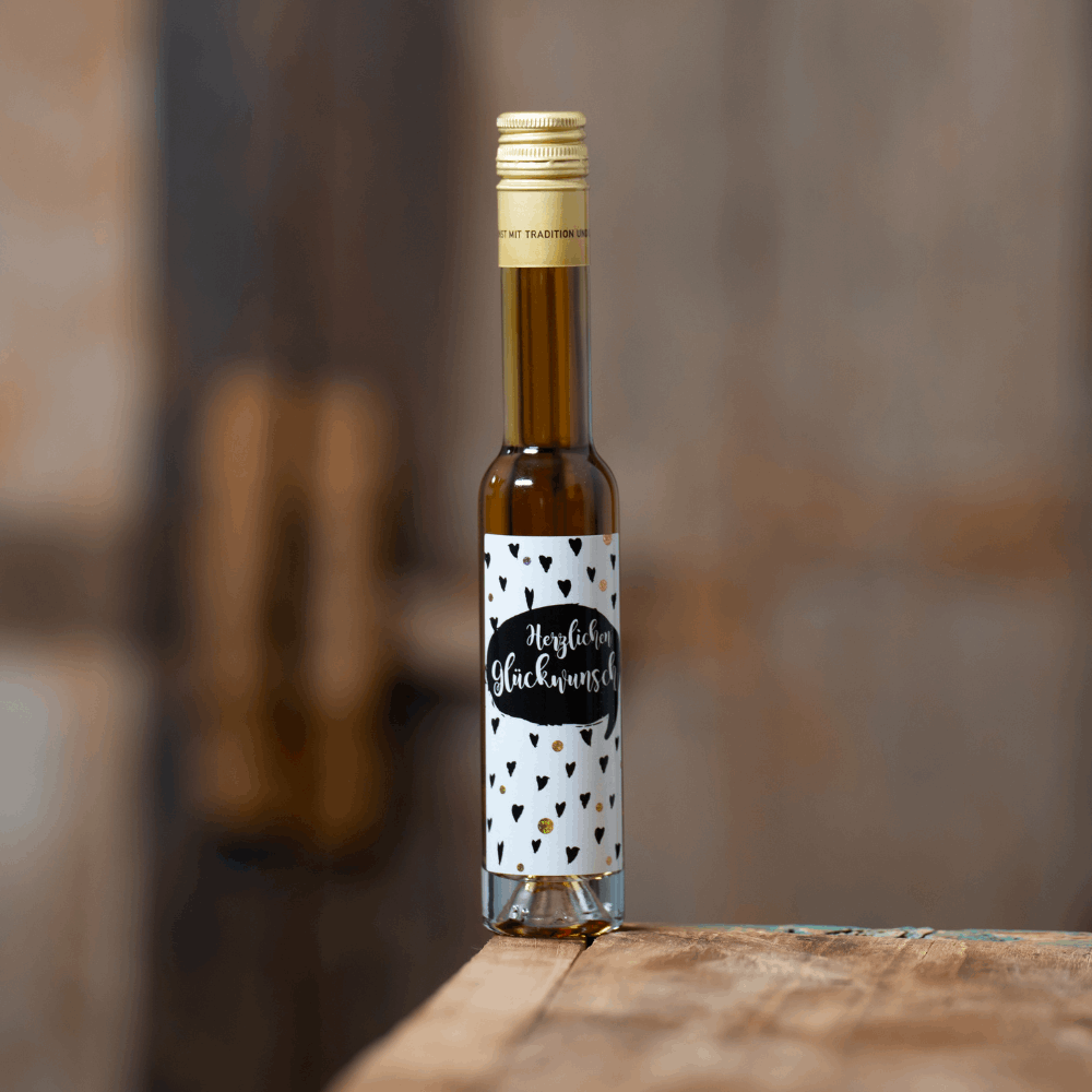 Butterscotch Likör mit 10% Whisky verfeinert I Flasche Glitzer-Motiv –  Destillerie & Likörmanufaktur Deheck